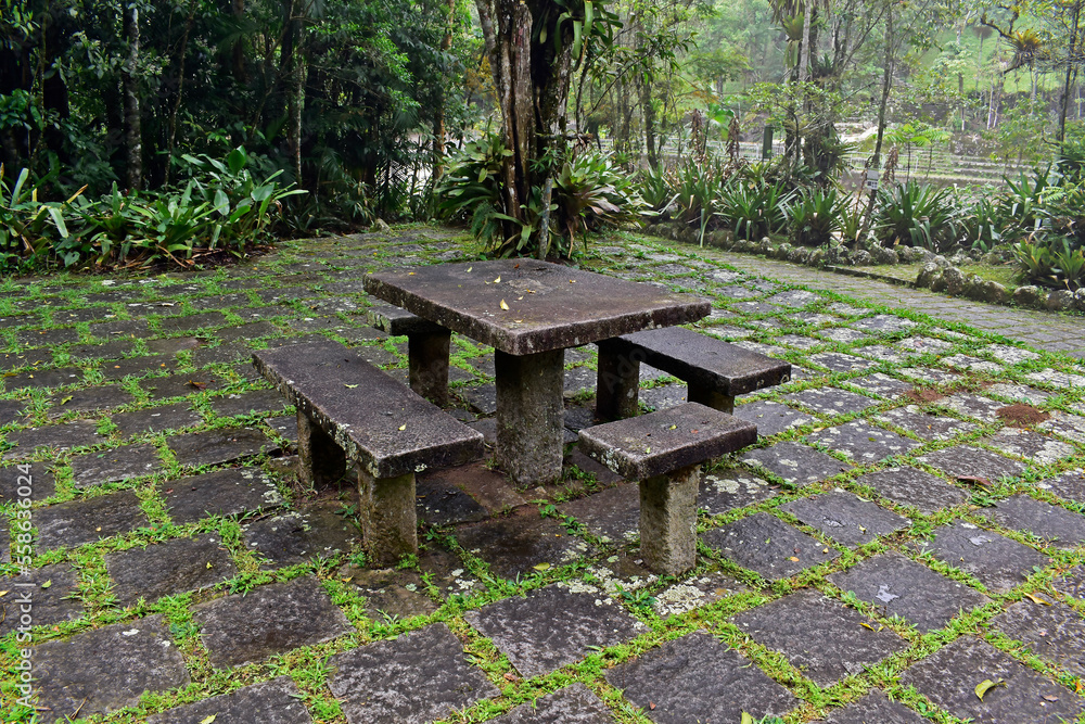 Empty table and benches on public park in Teresopolis, Rio de Janeiro, Brazil Empty table and benches on public park in Teresopolis, Rio de Janeiro, Brazil