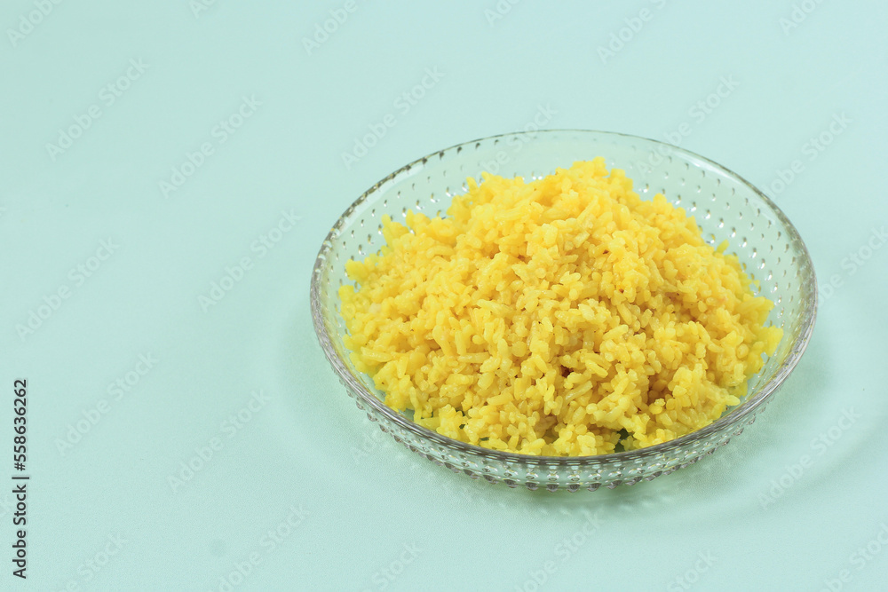 Nasi Kuning or Yellow Rice, Typical Indonesian Food. made from Rice Cooked with Turmeric, Nasi Kuning or Yellow Rice, Typical Indonesian Food. made from Rice Cooked with Turmeric,