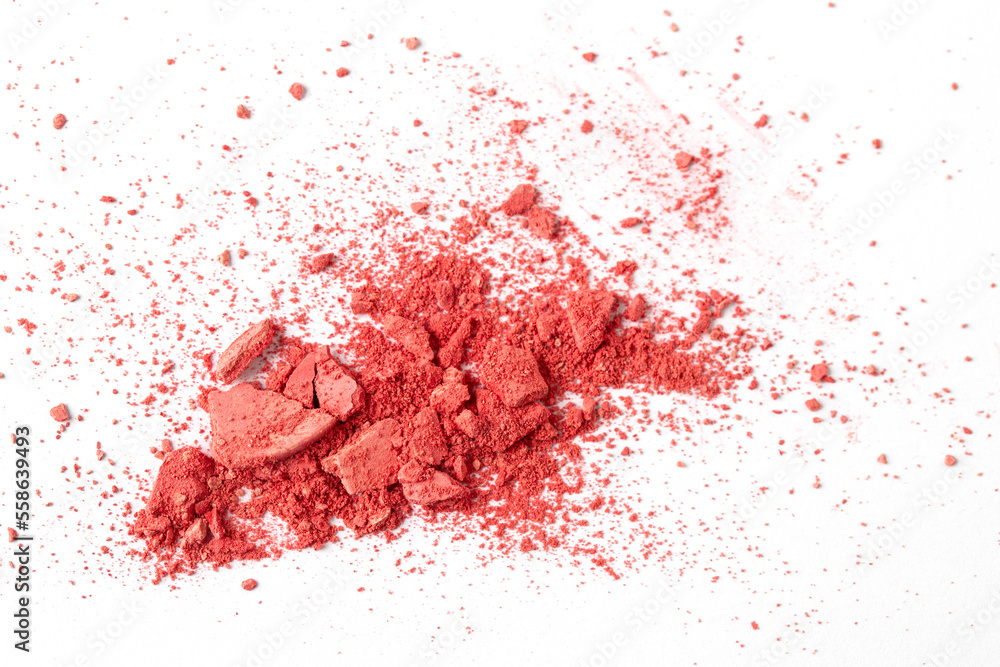 Pastel pink crashed blush or eye shadow on white background. Make up color swatch