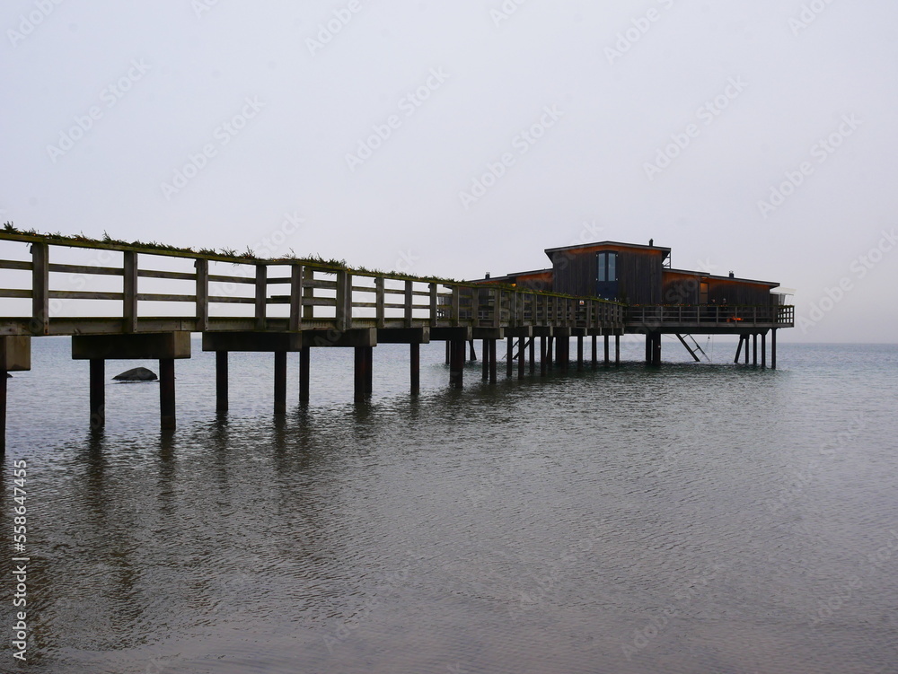 Wood bridge and sauna on the Kattegat sea.