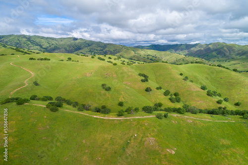 Upper Cottonwood Creek Wildlife Area. Beautiful Nature and Landscape. Green area with Cloudy Sky. Close to San Luis Reservoir. California  USA. Drone
