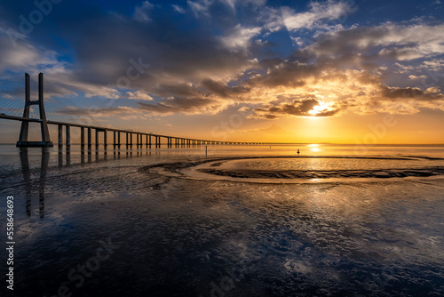 Sunrise in Vasco da Gama bridge Lisbon Portugal