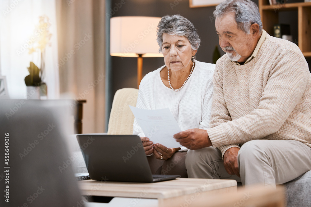 Laptop, documents and retirement with a senior couple planning their savings or investment portfolio. Budget, finance and pension with a mature man and woman working on a computer together in a home Laptop, documents and retirement with a senior couple planning their savings or investment portfolio. Budget, finance and pension with a mature man and woman working on a computer together in a home