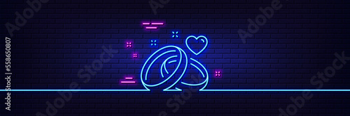 Neon light glow effect. Marriage rings line icon. Romantic engagement or wedding sign. Couple relationships symbol. 3d line neon glow icon. Brick wall banner. Marriage rings outline. Vector