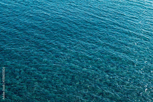 Clear blue waters of Aegean Sea on Tinos island, Cyclades, Greece