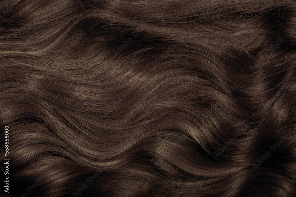 Naklejka premium Brown hair close-up as a background. Women's long brown hair. Beautifully styled wavy shiny curls. Hair coloring. Hairdressing procedures, extension.
