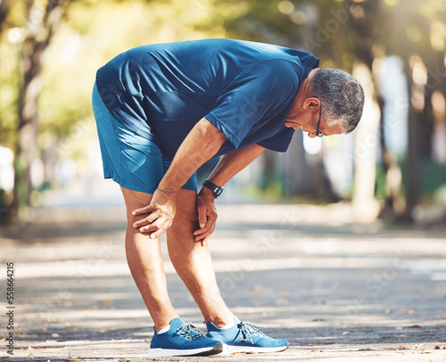 Billede på lærred Exercise, senior man and tired outdoor, breathing and balance for wellness, health and retirement