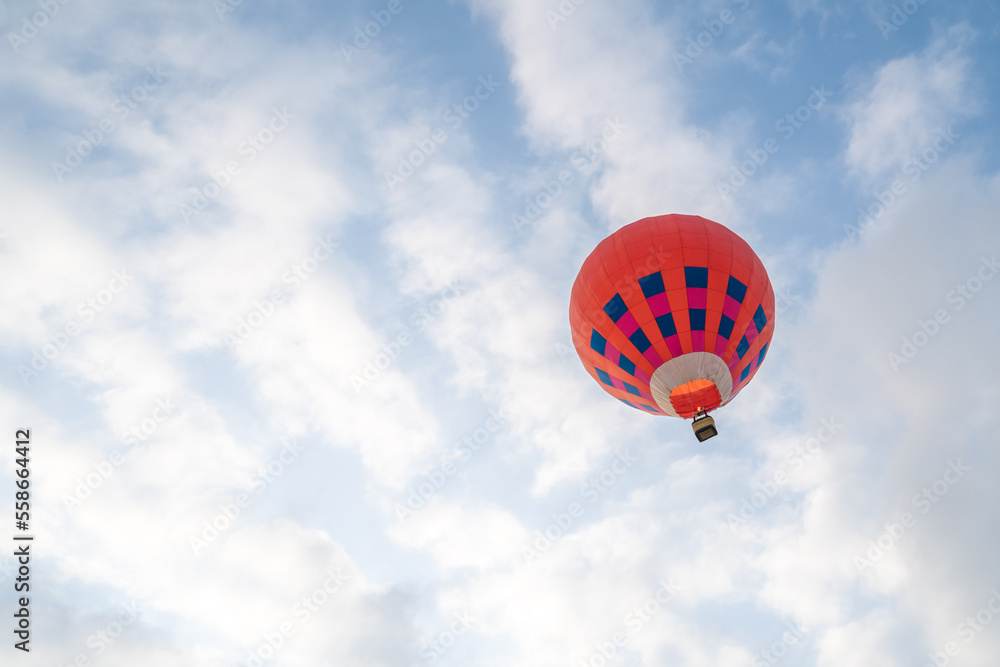 Naklejka premium Hot air balloons festival, colorful Hot air balloon in flight over blue sky