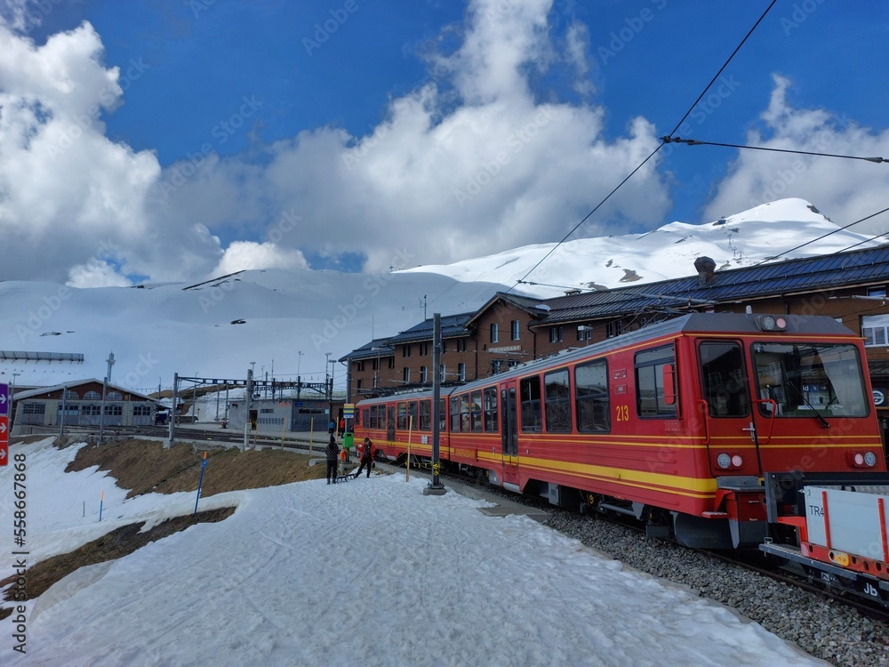 Train in the Swiss Alps, Jungfraubahn railroad near the village Grindelwald under the mountain Eiger