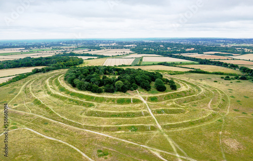Badbury Rings prehistoric Iron Age hill fort near Bournemouth, Dorset. Aerial looking southeast
