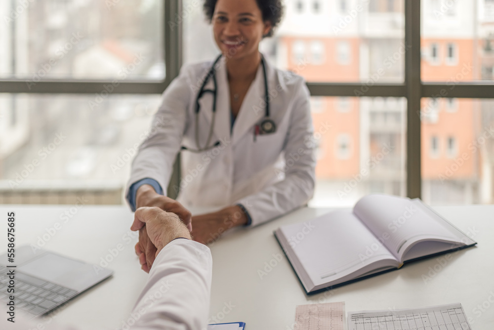 Smiling african-american medical worker, applying for a job in a hospital. Smiling african-american medical worker, applying for a job in a hospital.