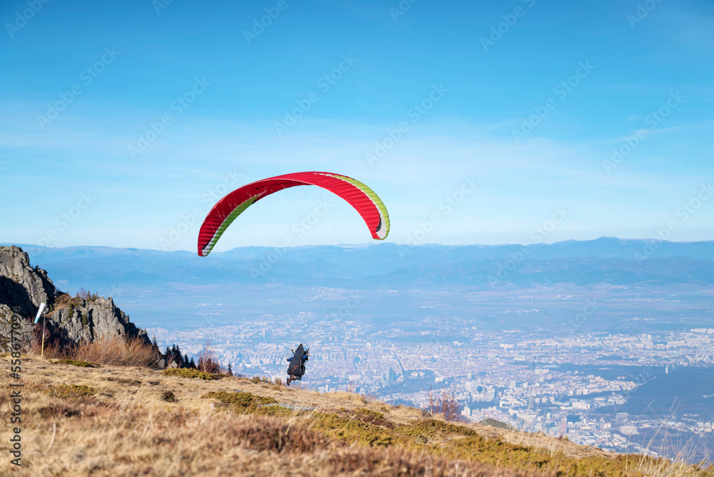 Paraglider at the start above the city of Sofia ,Bulgaria Paraglider at the start above the city of Sofia ,Bulgaria