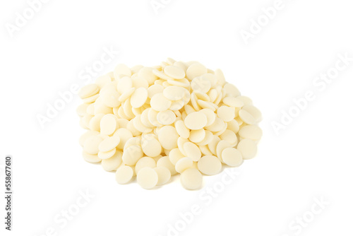 Heap of icing in the form of milk chocolate drops on a white background.