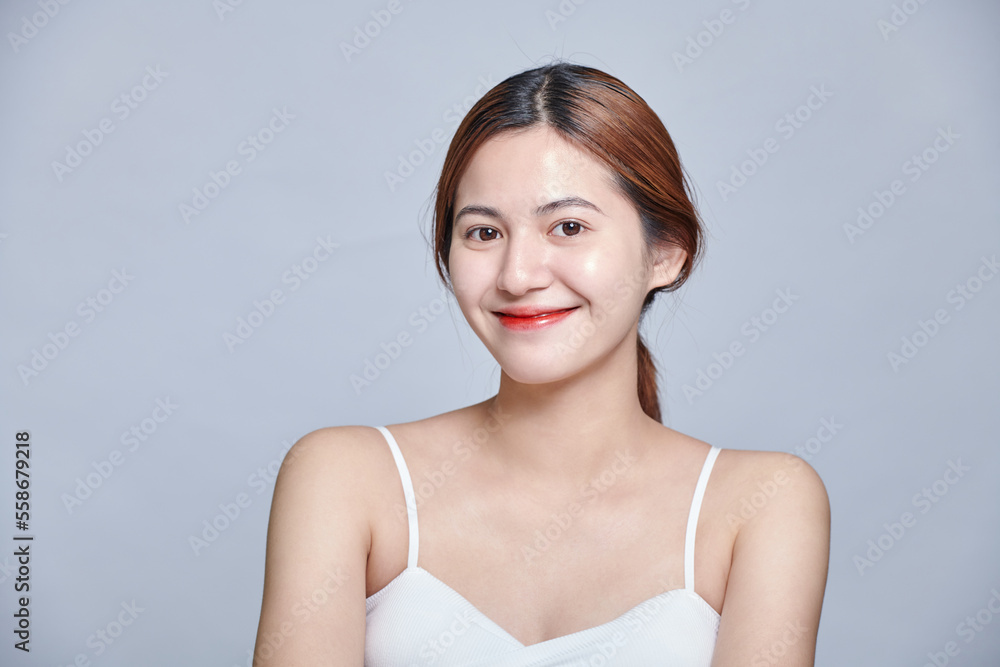 Portrait of beautiful asian woman with young clean healthy skin, studio shot isolated background. Anti-aging and beauty facial treatment. Portrait of beautiful asian woman with young clean healthy skin, studio shot isolated background. Anti-aging and beauty facial treatment.