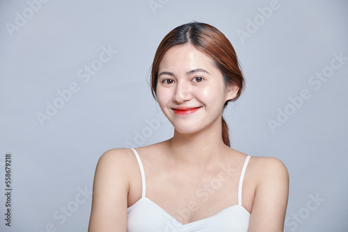 Portrait of beautiful asian woman with young clean healthy skin, studio shot isolated background. Anti-aging and beauty facial treatment.