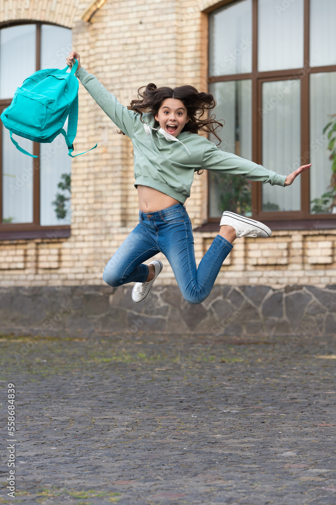 school girl childhood jump outdoor. school girl jump childhood outside. school girl jump ภาพถ่าย