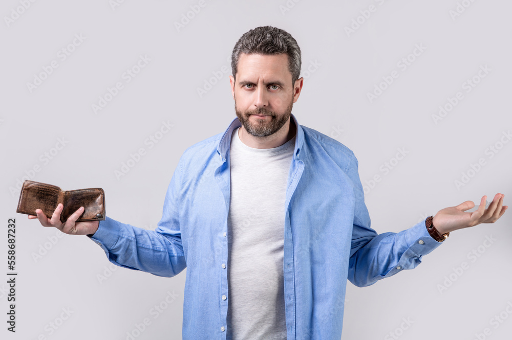 photo of shrugging moneyless man with wallet. moneyless man with wallet photo of shrugging moneyless man with wallet. moneyless man with wallet