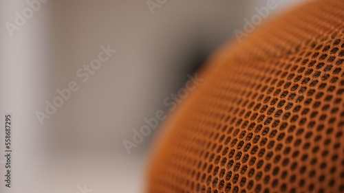 Close up of a seat cover with holes