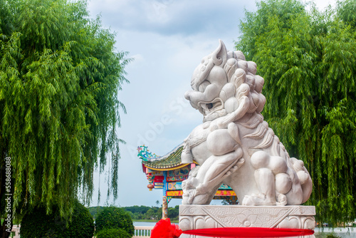 white jade Chinese guardian lion in Thai-Chinese Cultural Center, Udon thani,  Thailand