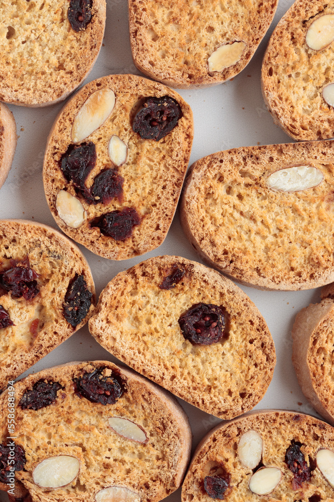 Biscotti cantucci cookies with almond and cranberry on white background top view Biscotti cantucci cookies with almond and cranberry on white background top view