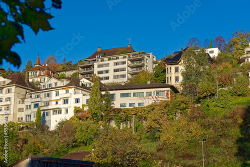 Residential buildings at hill of Swiss City of Biel Bienne, Canton Bern, on a sunny autumn day. Photo taken November 10th, 2022, Biel Bienne, Switzerland.