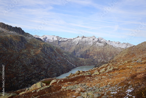 View on a lake in the Grimsel Pass which is a mountain pass in Switzerland, crossing the Bernese Alps at an elevation of 2,164 metres