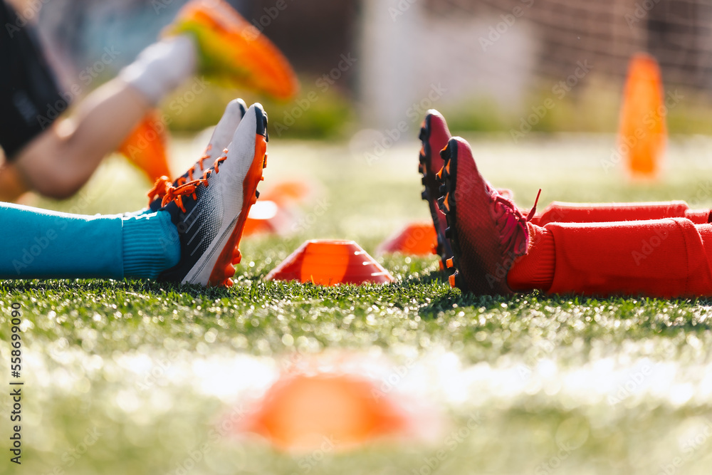 Red and shop blue soccer cleats