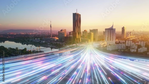 modern city development rays beams of light running over cityscape aerial view,fast internet high speed optical fiber connection,global communication

