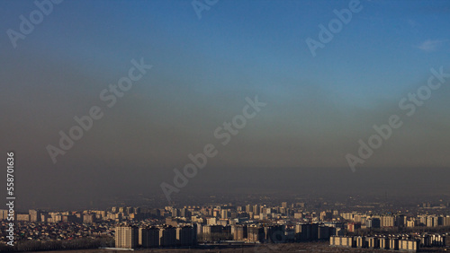 thick smog from coal in the sky over a big city
