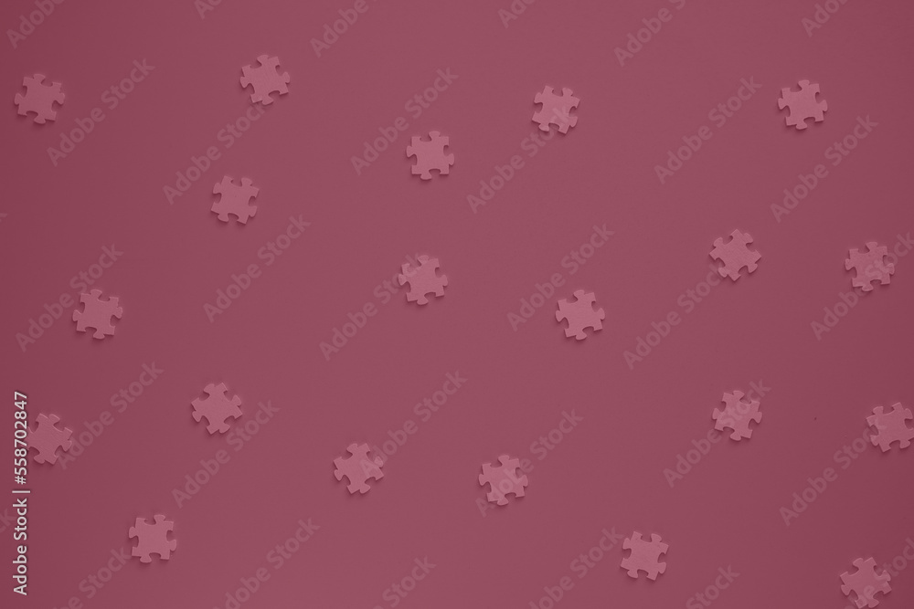 Flat blank wooden puzzles on rose background view from above. Festive background for a congratulatory inscription. New Year, Christmas, Valentine, Birthday. Festive decor. Blurred background Flat blank wooden puzzles on rose background view from above. Festive background for a congratulatory inscription. New Year, Christmas, Valentine, Birthday. Festive decor. Blurred background