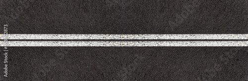 Bandes blanches sur asphalte 