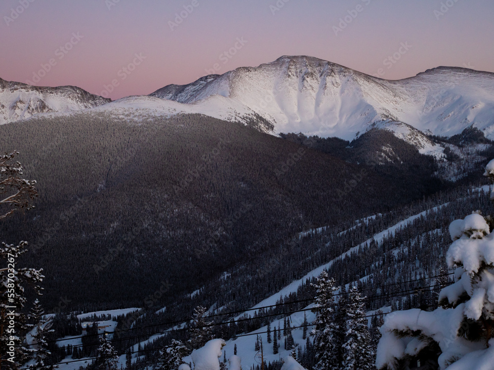 Ski slopes and mountains at sunset in Winter Park Colorado