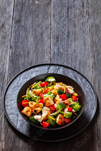 fried chicken tenders broccoli salad in bowl