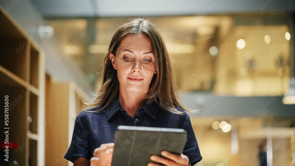 Female Data Analyst Smiling While Checking New Data for the Day. Portrait of White Businesswoman Walking Towards her Business Office in a Spacious Corporate Building. Low Angle Female Data Analyst Smiling While Checking New Data for the Day. Portrait of White Businesswoman Walking Towards her Business Office in a Spacious Corporate Building. Low Angle