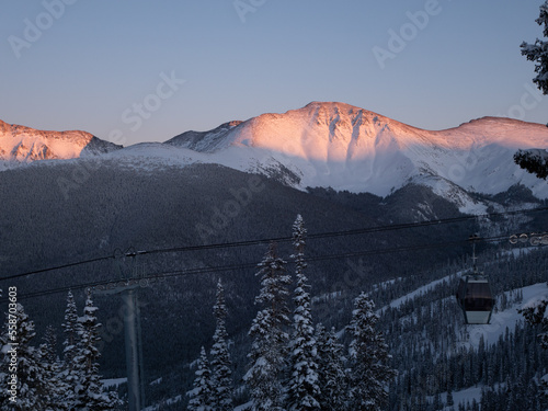 Ski slopes and mountains at sunset in Winter Park Colorado photo