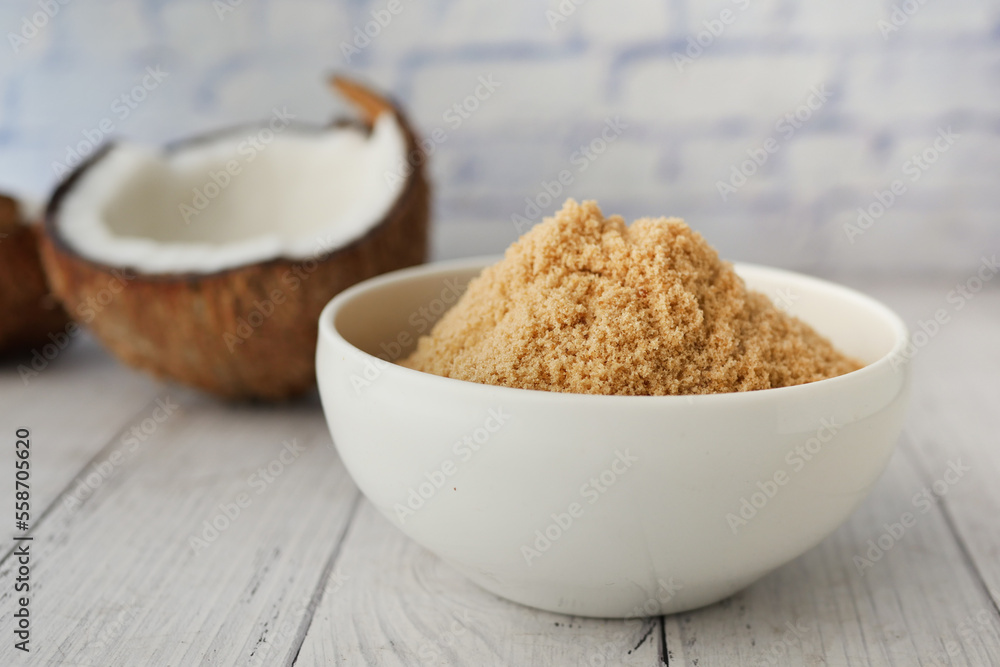coconut sugar in a white bowl on table coconut sugar in a white bowl on table