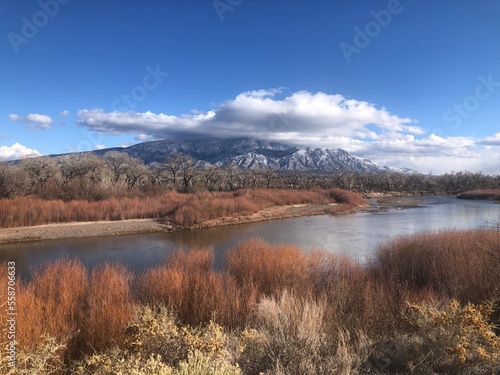 The Rio Grande in winter with a view of the Sandia Mountains