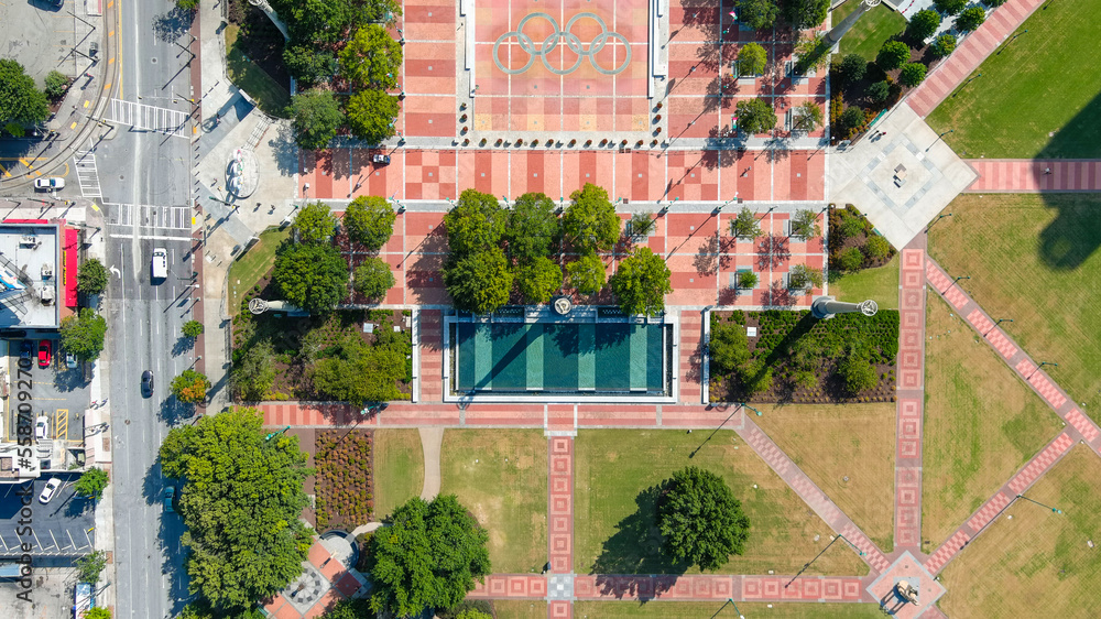 an aerial shot of Centennial Olympic Park in downtown Atlanta with red