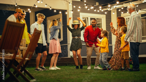 Wallpaper Mural Parents, Children and Multicultural Friends Dancing Together at a Garden Party Disco Event at Home. Young and Senior People Relaxing, Having Fun on a Summer Evening. Torontodigital.ca