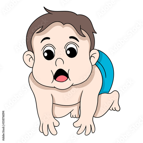 baby boy is crawling trying to get closer