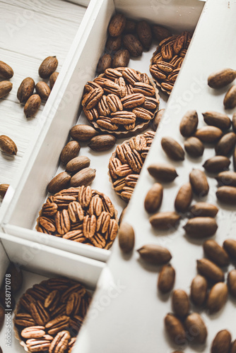 Pecan tart, with a pastry base and a covering of pecan nuts photo