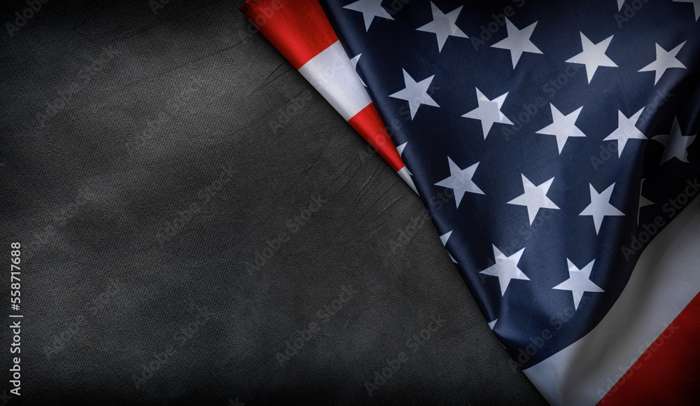 Fototapeta premium USA flag on a dark background. American flag element on a black background. Patriotic concept.