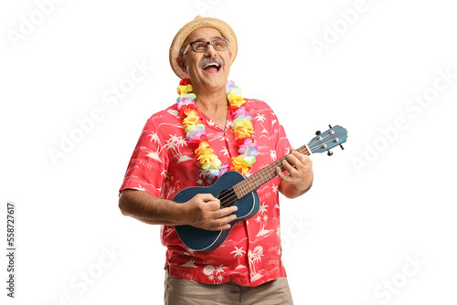 Tableau sur toile Mature male tourist playing ukulele and singing