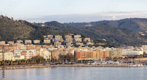 Touristic City by the Sea. Salerno, Italy. Aerial View. Cityscape and mountains background