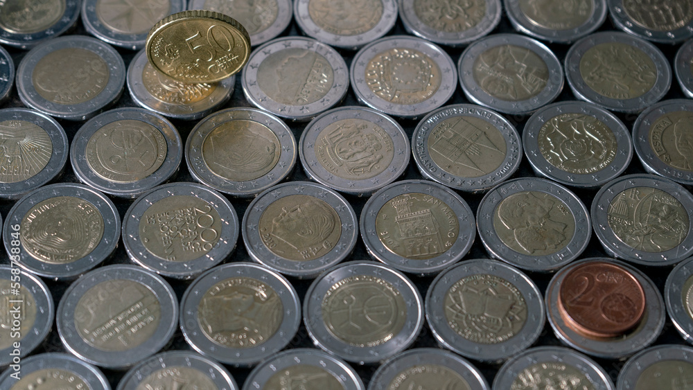 Euro coins on a dark background Euro coins on a dark background