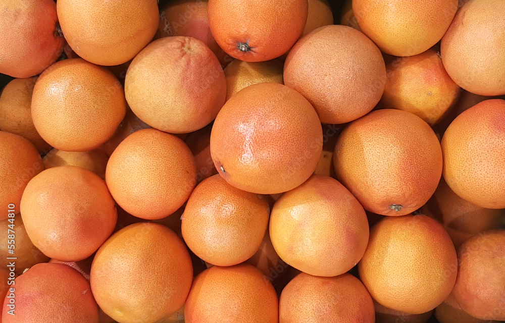 Grapefruit background. Natural organic grapefruit, top view.