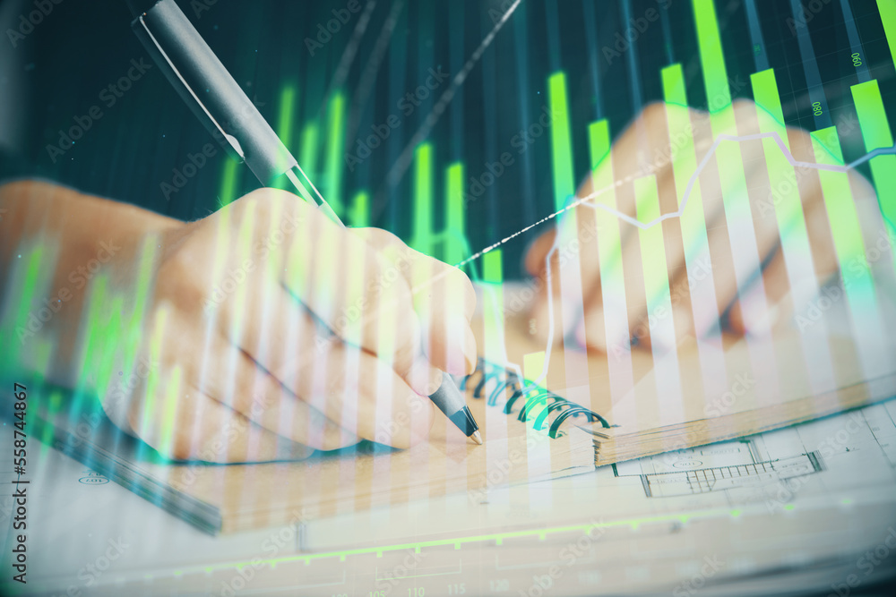 Forex chart displayed on woman's hand taking notes background. Concept of research. Double exposure Forex chart displayed on woman's hand taking notes background. Concept of research. Double exposure