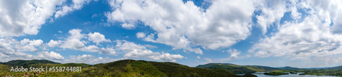 aerial panorama of beautiful clouds over the mountain hills © EdVal