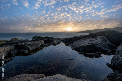 Otter Point overlook tide pool sunset in Acadia National Park  Maine 