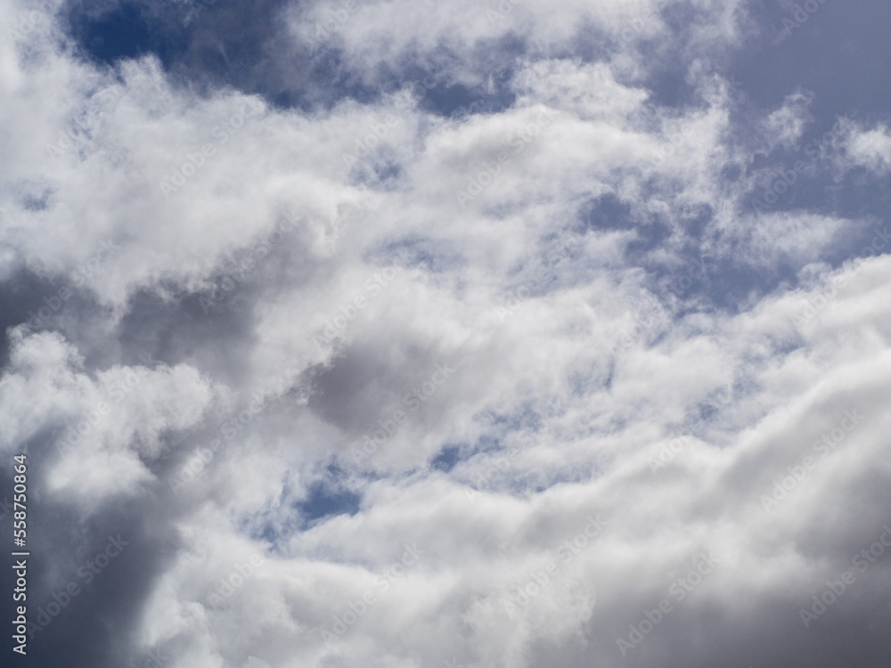 Rainy clouds formation under a blue sky. Rainy clouds formation under a blue sky.